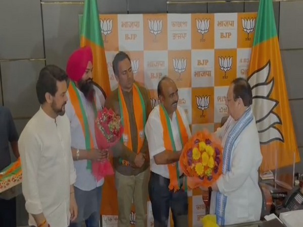AAP Himachal president Anup Kesari, 2 others join BJP. (Photo/ANI)