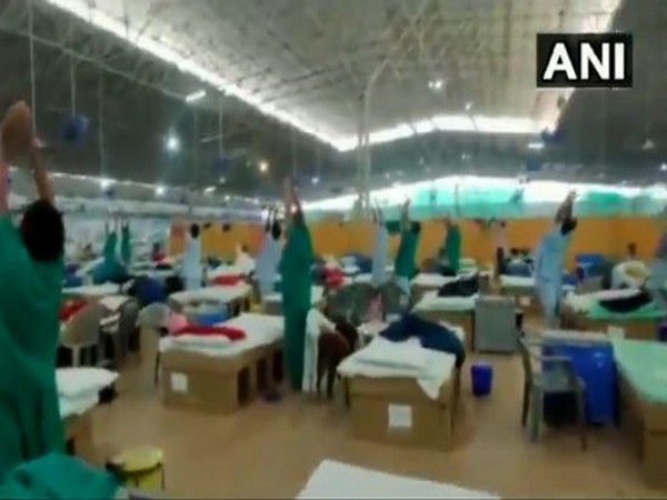 Covid-19 positive patients performing yoga in Delhi. (Photo/ANI)