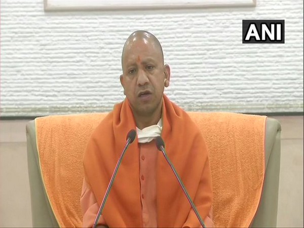 Uttar Pradesh Chief Minister Yogi Adityanath speaking to reporters on Monday.