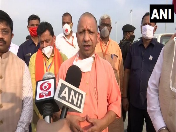 Uttar Pradesh Chief Minister Yogi Adityanath speaking to reporters 
