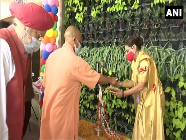 UP CM Yogi Adityanath along with Civil Aviation Minister Hardeep Singh Puri lays foundation stone for expansion of Gorakhpur Airport terminal building. (Photo/ ANI)