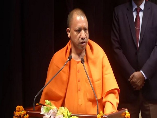 Uttar Pradesh Chief Minister Yogi Adityanath addresses a public event in Lucknow on Friday [Photo/ANI]