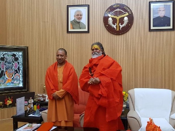 UP Chief Minister Yogi Adityanath with Mahant Narendra Giri [Photo/ANI]