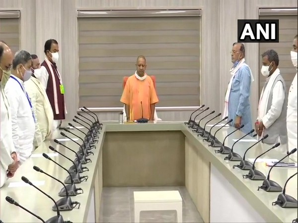 Uttar Pradesh Chief Minister Yogi Adityanath and other ministers holding two minute silence as a tribute to Chetan Chauhan. (Photo/ANI)