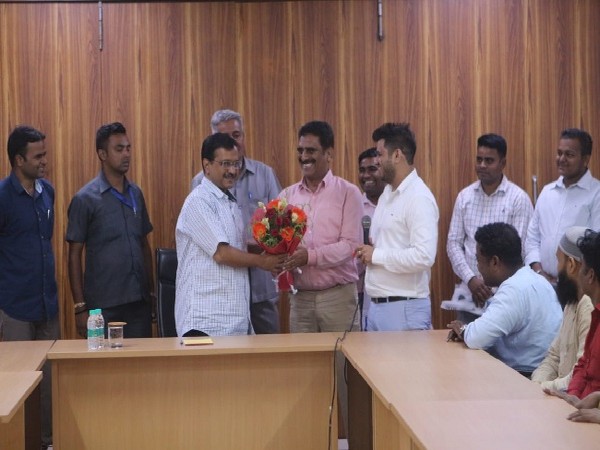 Youth Congress leader Naveen Namberdar with his supporters joining APP in the presence of Delhi Chief Minister Arvind Kejriwal on Saturday. 