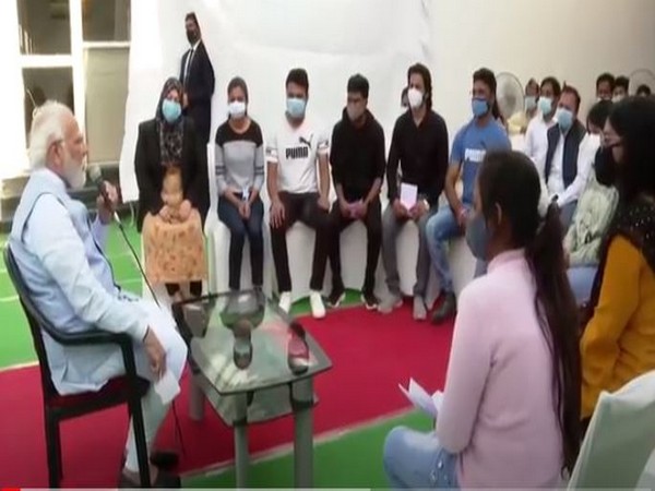 Prime Minister Narendra Modi interacting with Indian students in Varanasi (Photo/ANI)