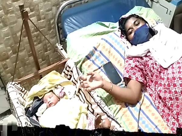Woman gives birth to baby in a car in Visakhapatnam [Photo/ANI]