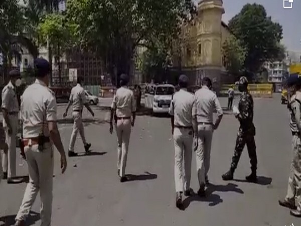 Policemen at a street of Madhy Pradesh. (Photo/ANI)