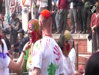 Foreigners soak in Holi Festivities at Kathmandu Durbar Square