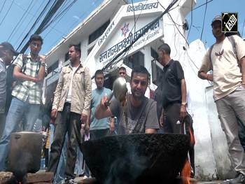 Nepal students protest cooking gas shortage with symbolic roadside meal